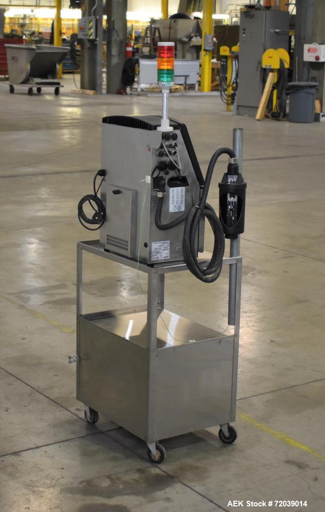 Used Video Jet Ink Jet Coding Machine, Model 1510. Capable of speeds up to 279 m/min (914 ft/min). Has a single print head with up to five lines of type. Communications: Ethernet and RS-232 Serial. 1...
